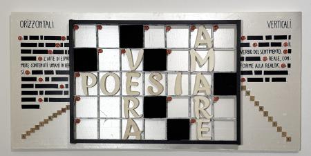 L’enigma poetico (tributo a Emilio Isgrò), 2025, materiali vari di recupero e nastro isolante nero su pannello in schiuma per edilizia 133 x 54 cm